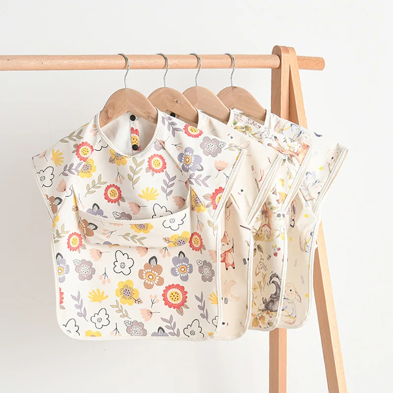 kf-S7819c9d4cabb4acbbfe82412557ded24C Newborn Bibs Blouse Waterproof No-sleeved Reverse Dressing Infant Eating Clothes Apron Bib Protective Clothing - Image 1