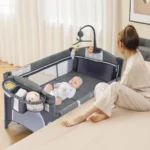 Pack and Play, 5 in 1 Bedside Sleeper with Bassinet, Diaper Changer, Mattress, Carry Bag, Music Box Hanging Toys, Foldable